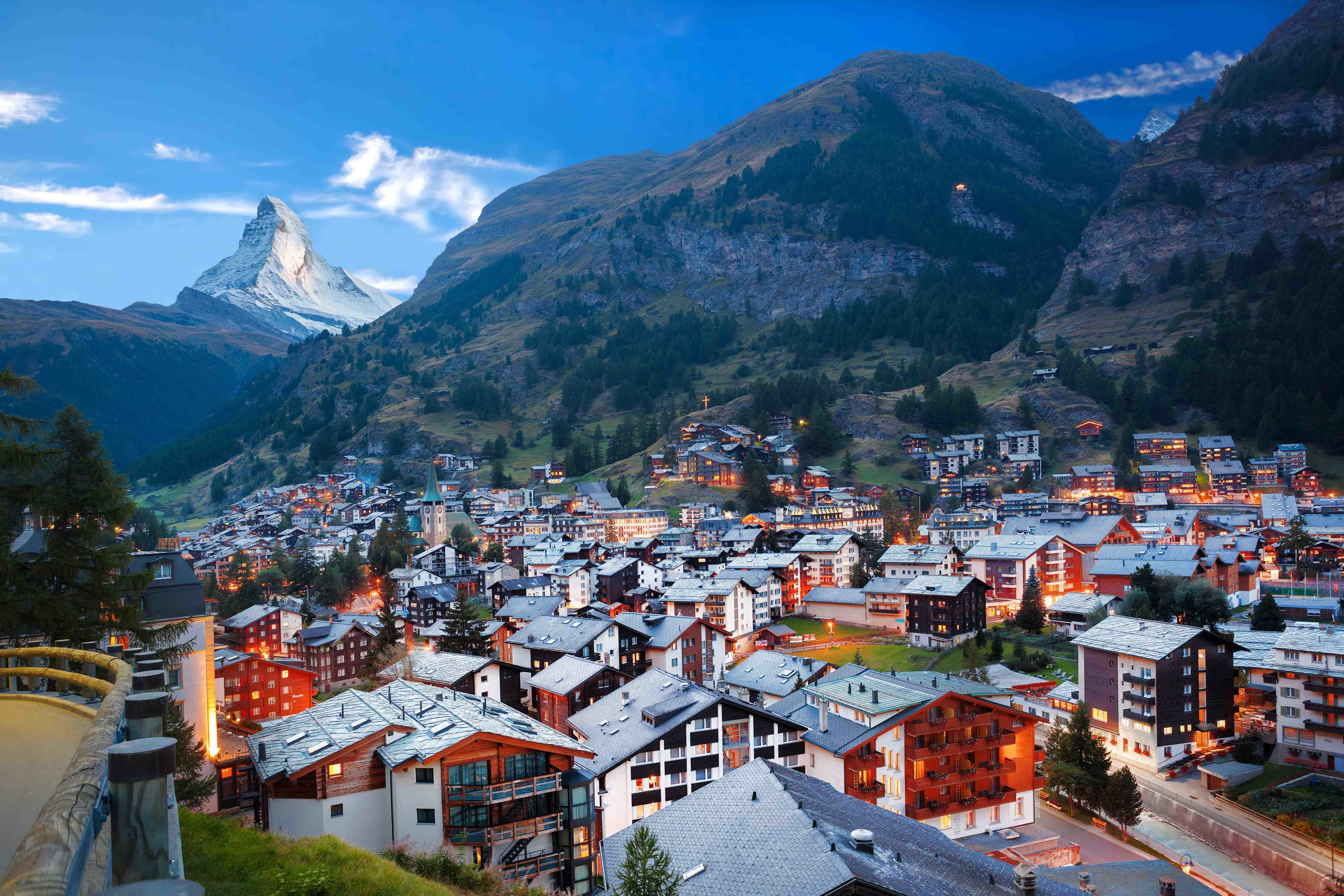 Winter view of Zermatt with the Matterhorn in the background during dusk in Switzerland.